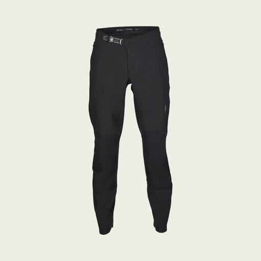 dark mtb pants on green background
