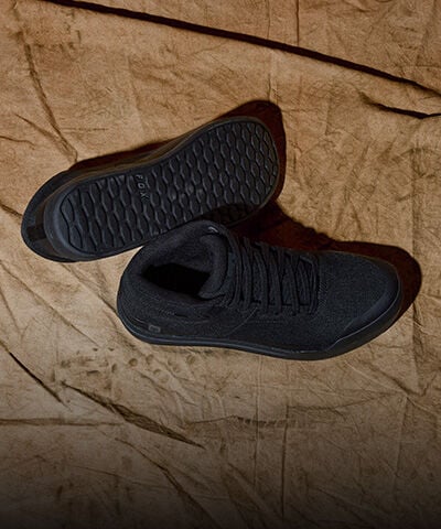 Speedframe bike helmet floating with vegetation in the back